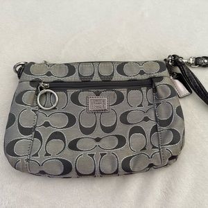 Used silver Coach large wristlet
